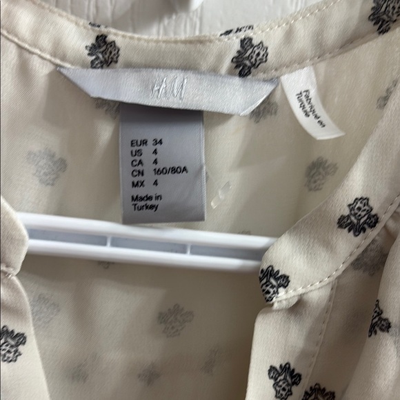 NWOT H&M Cream Sleeveless Dress with Black Pattern - Picture 2 of 4